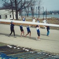 Men s 8 - Carrying the Pytte to the dock